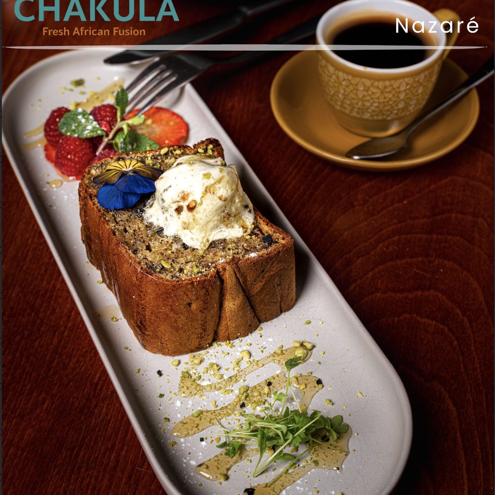 Pistachio banana bread with ice cream and fresh berries at Chakula Nazaré