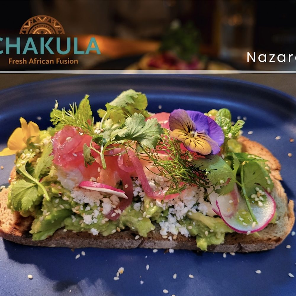 Avocado toast with pickled onions, radish and edible flowers at Chakula Nazaré