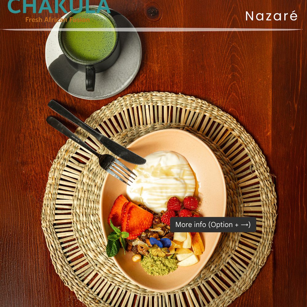 Yogurt bowl with granola, fresh fruits and matcha at Chakula Nazaré